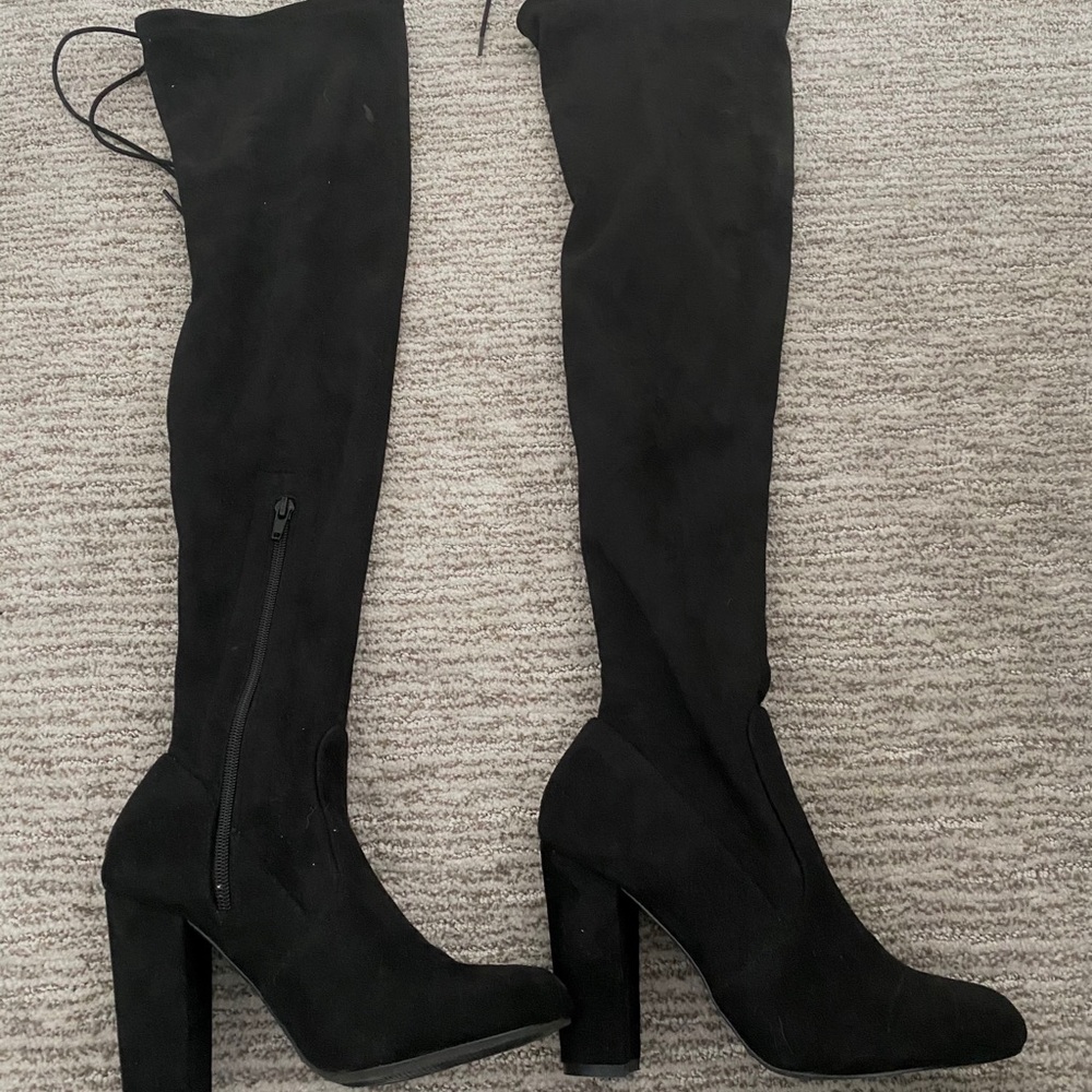 High rise knee boots.